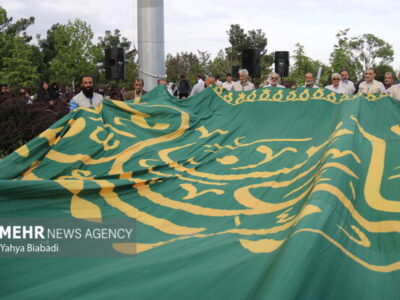 تعویض پرچم رضوی در میدان قائم آمل